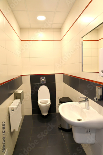 Interior of a public toilet in light tones