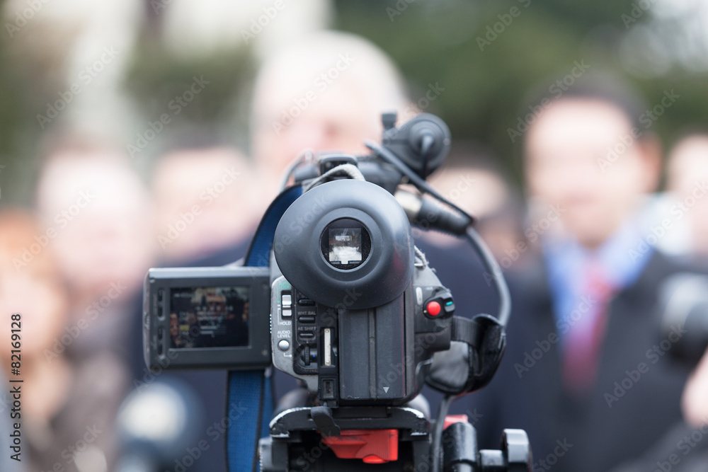 Covering an event with a video camera Covering an event with a video camera