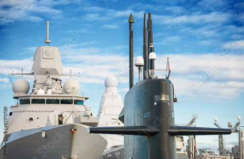 Fotografie Naval fleet. Submarine and warships with guns.
