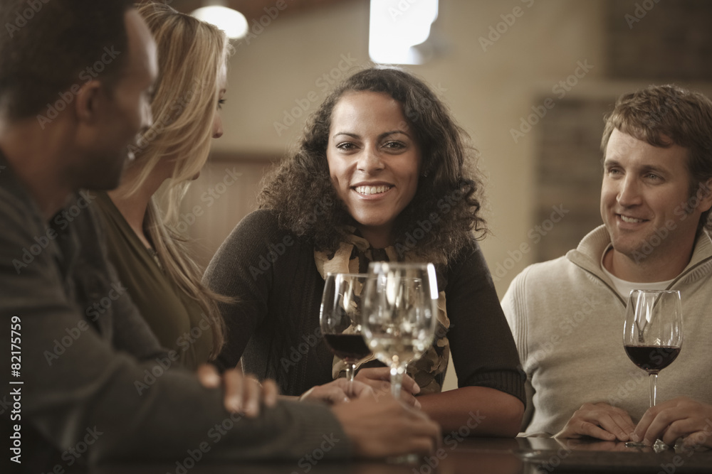 Friends drinking wine together