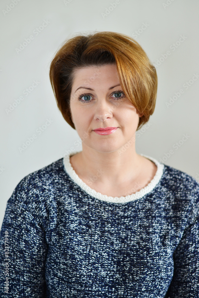 Portrait of the adult female on light background Portrait of the adult female on light background