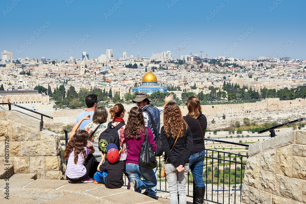 Fototapeta premium Tourists are looking at the beautiful view of Jerusalem