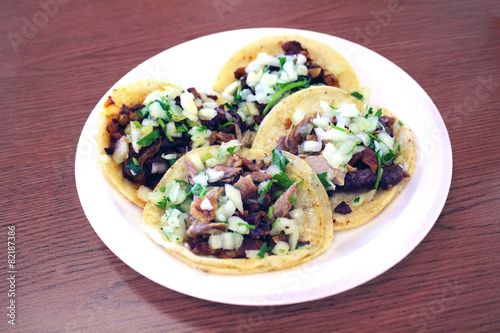 Carne Asada and Carnitas Taco Plate