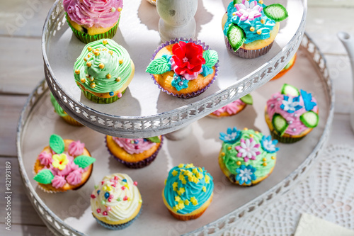 Tasty muffins with sweet decoration