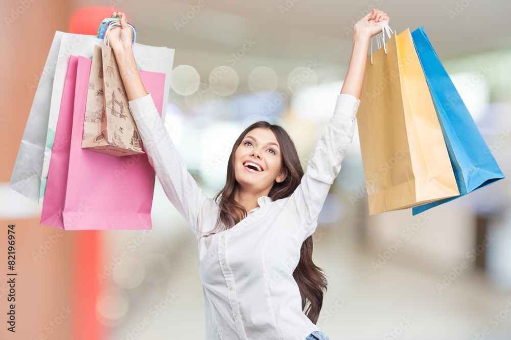 Summer. Shopping and tourism concept - woman with shopping bags Summer. Shopping and tourism concept - woman with shopping bags