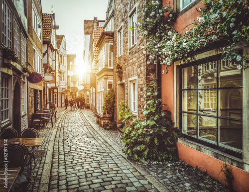 Old town in Europe at sunset with retro vintage filter effect © JFL Photography