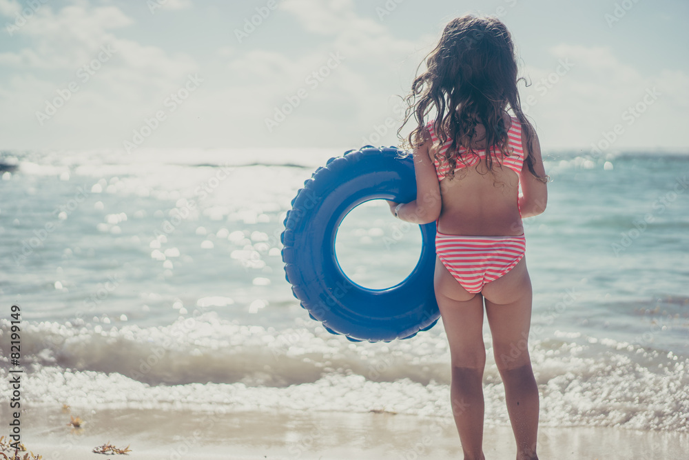 Cute girl at the beach
