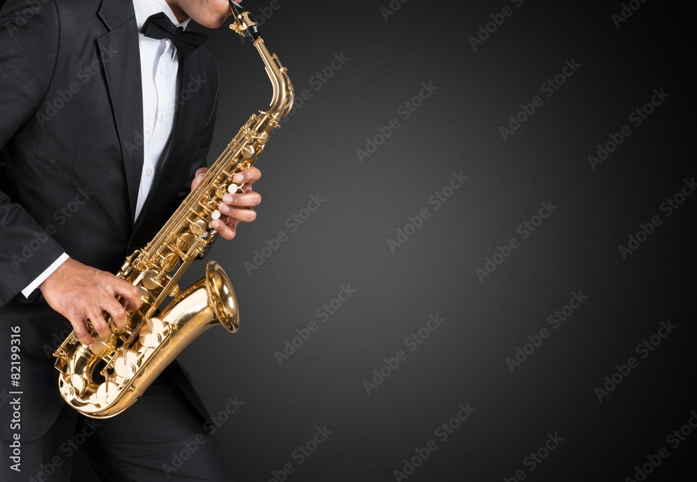 Naklejka premium Sax. Black american jazz saxophone player. Vintage. Studio shot.