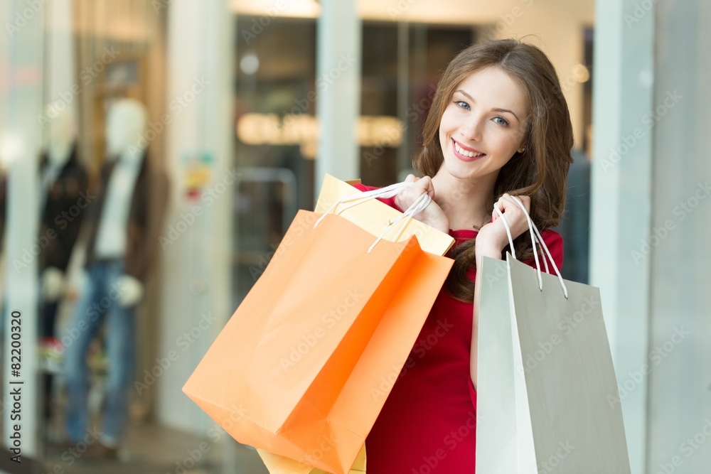 Tree. Sale, gifts, holidays and people concept - smiling woman Tree. Sale, gifts, holidays and people concept - smiling woman