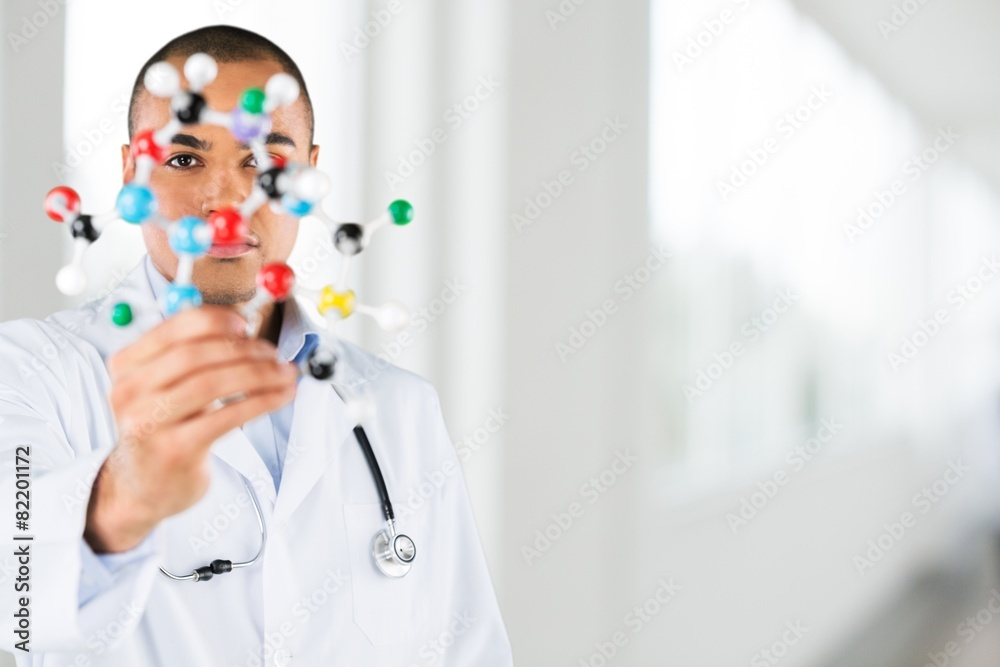 Naklejka premium Student. Macro of a student in a chemistry lab holding in hands
