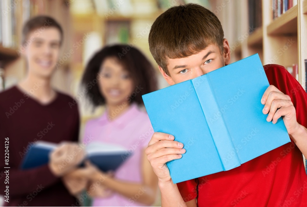 Student. Attractive Young Man Holding Open Book with Blank Pages Student. Attractive Young Man Holding Open Book with Blank Pages
