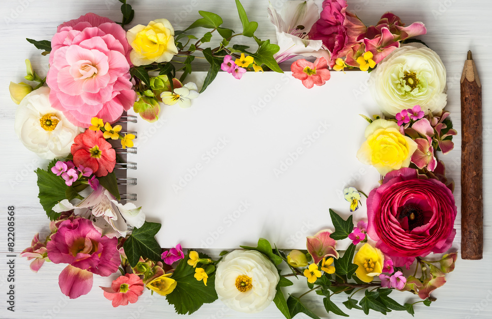 Flowers and notepad