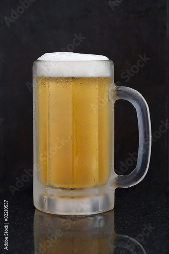 Close up of mug of beer photo