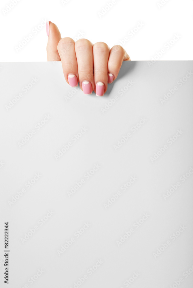 Female hand holding paper blank isolated on white Female hand holding paper blank isolated on white