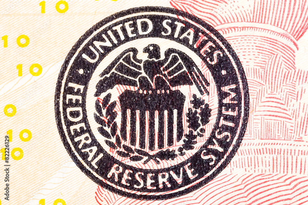 Obraz premium Federal Reserve icon on a ted dollar bill.