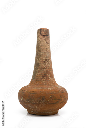 Antique clay jug isolated on white background © pixs4u