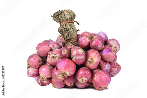 Shallot onions in a group isolated on white background