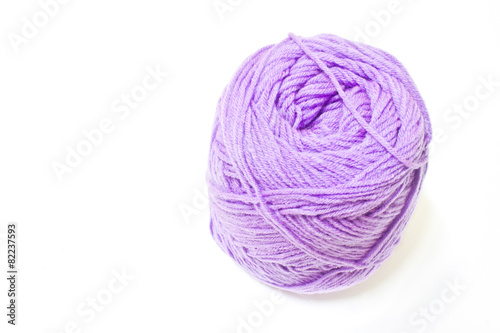 Violet yarn on white background