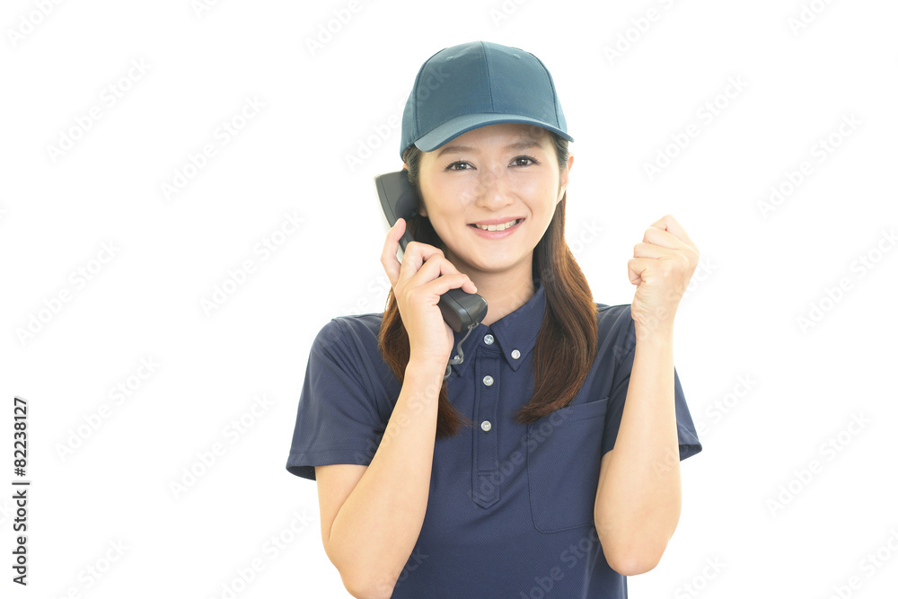 受話器を持つ作業員 受話器を持つ作業員