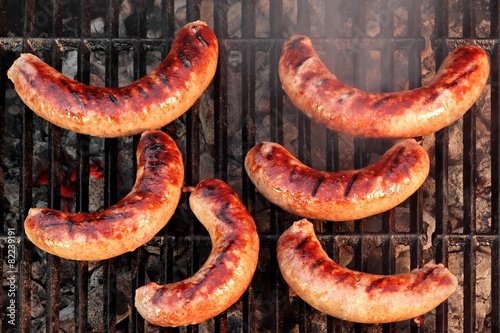BBQ Bratwurst Sausages On The Hot Grill, Top View