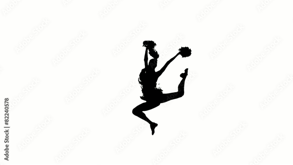 Young cheerleader with pom-poms smiling at camera, acrobatic Young cheerleader with pom-poms smiling at camera, acrobatic