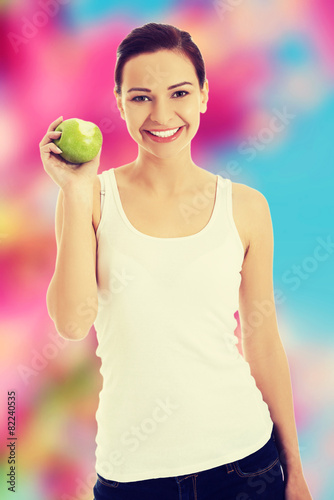 Woman holding an apple