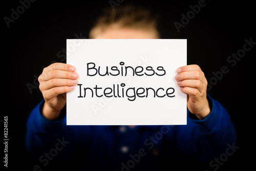 Person holding Business Intelligence sign