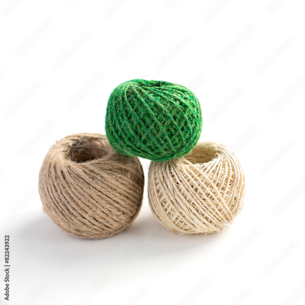 Three isolated skeins of thread Three isolated skeins of thread