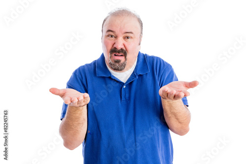 Man shrugging his shoulders and gesticulating