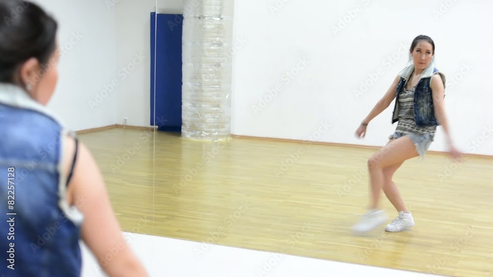 young attractive asian woman dancing - hall - mirror young attractive asian woman dancing - hall - mirror