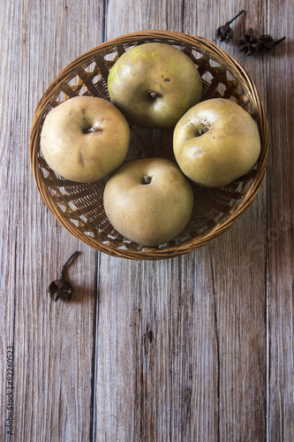 Apples in a rustic bowl