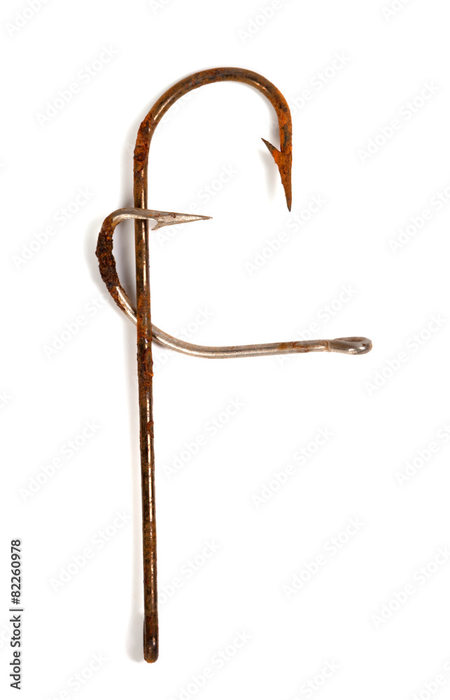 Letter F composed of old rusty fish hooks Letter F composed of old rusty fish hooks