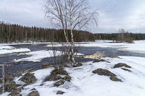 Rapids on Shuya river in winter. Karelia, Russia.