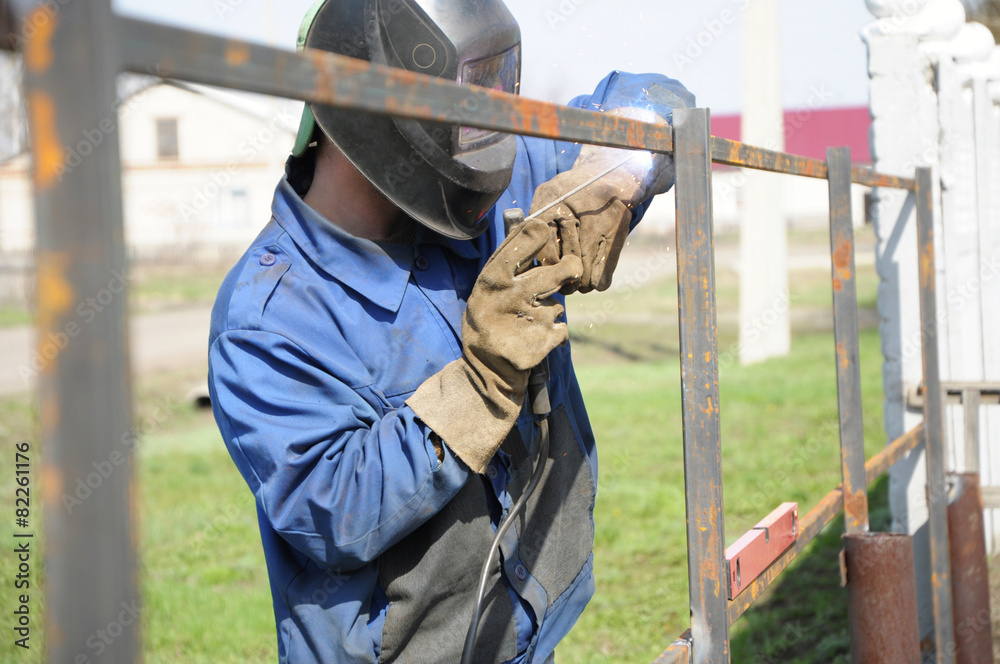 welder hammering welder hammering