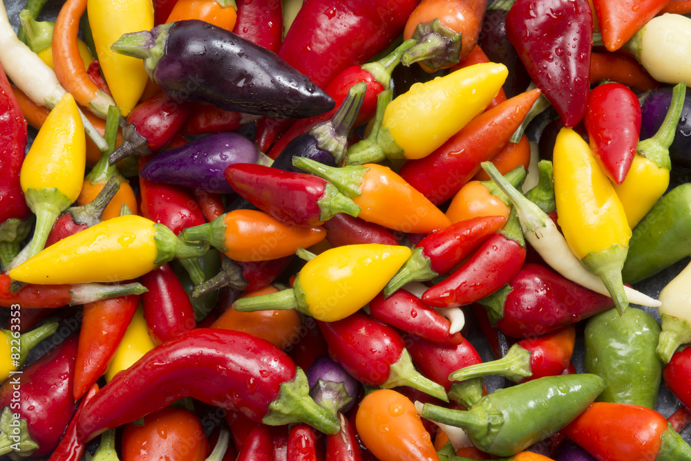 mixed hot peppers in wok pan mixed hot peppers in wok pan