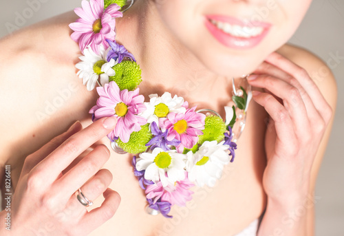 Woman with flower necklace