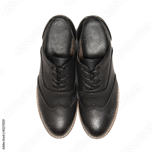 Black shoes isolated on white background. top view