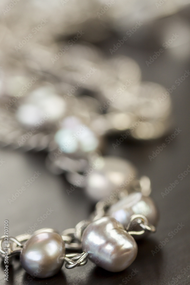 Assorted silver costume jewellery with a jumbled pile