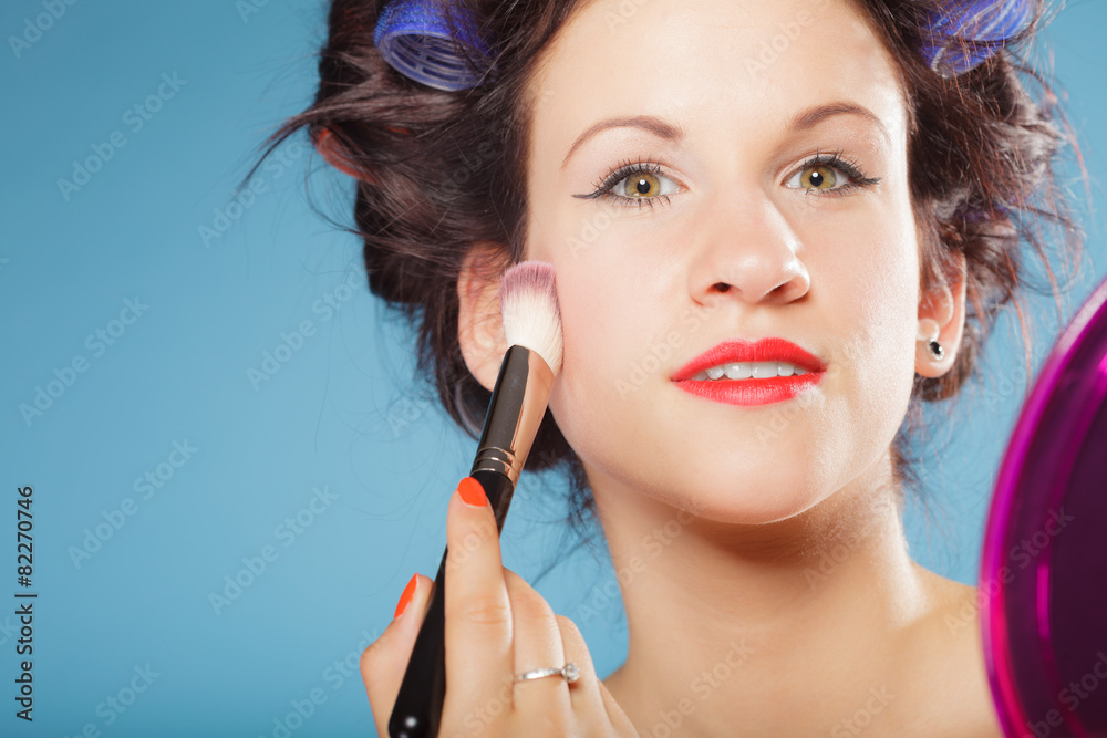 woman applying rouge blush makeup woman applying rouge blush makeup