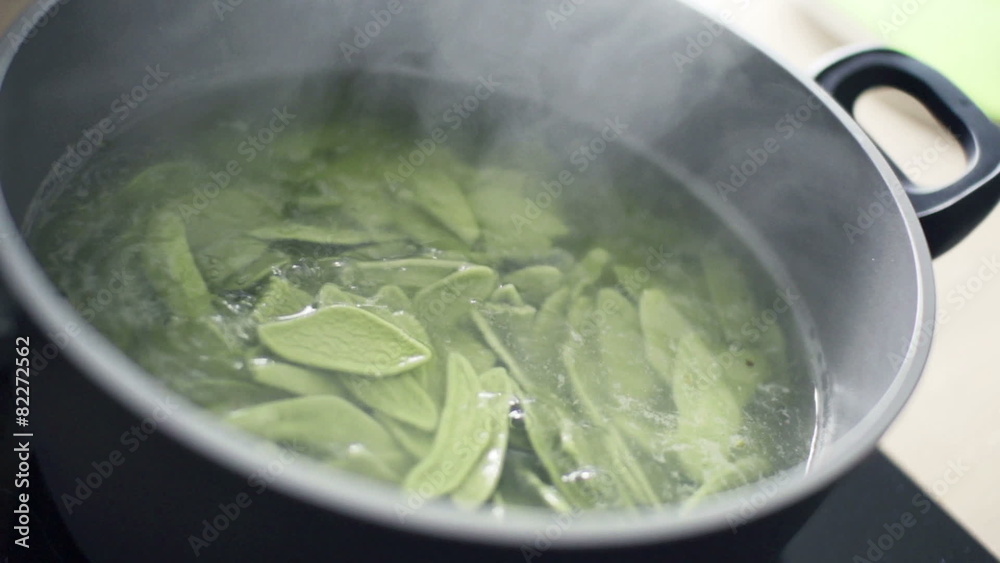 Cooking pasta in pot, slow motion shot at 240fps Cooking pasta in pot, slow motion shot at 240fps