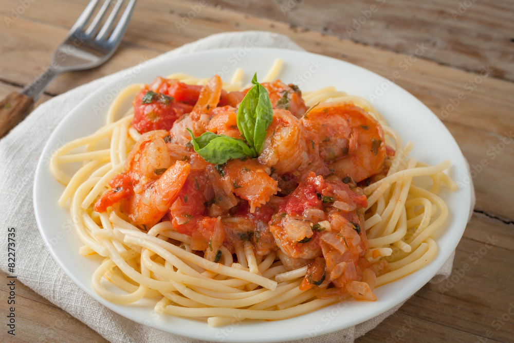 shrimp in wine tomato sauce over spaghetti pasta shrimp in wine tomato sauce over spaghetti pasta