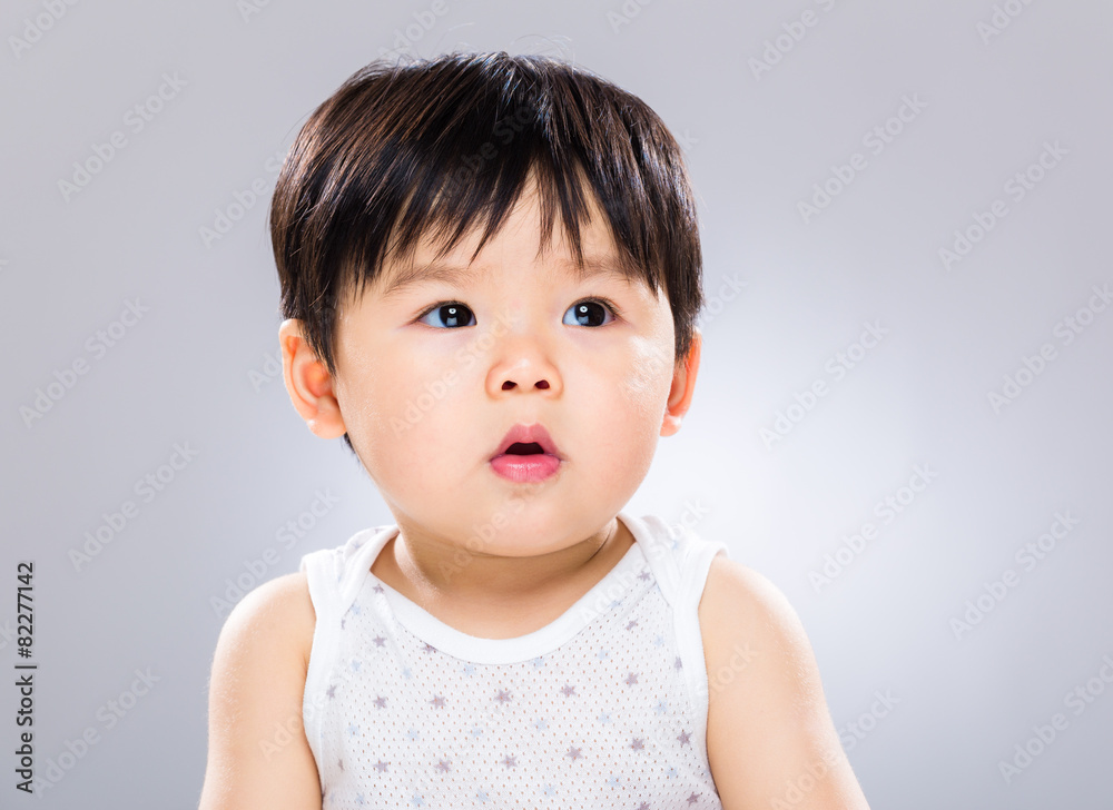 Asian baby boy looking at other side Asian baby boy looking at other side