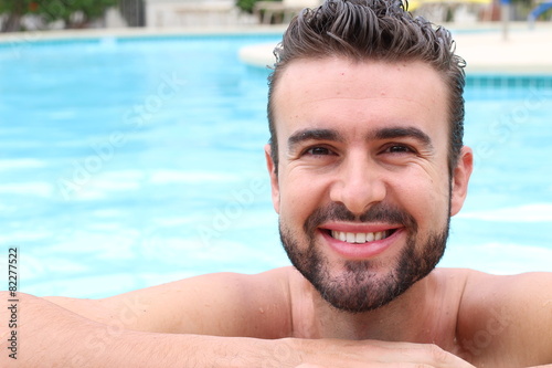 Portrait of a handsome natural man in the pool