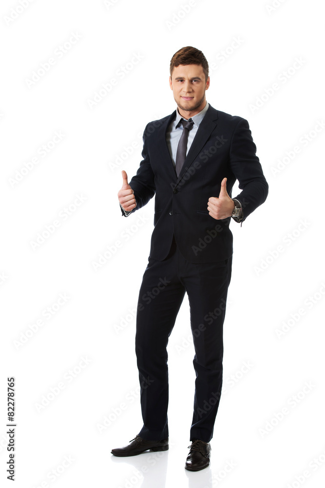 Happy smiling businessman with thumbs up. Happy smiling businessman with thumbs up.