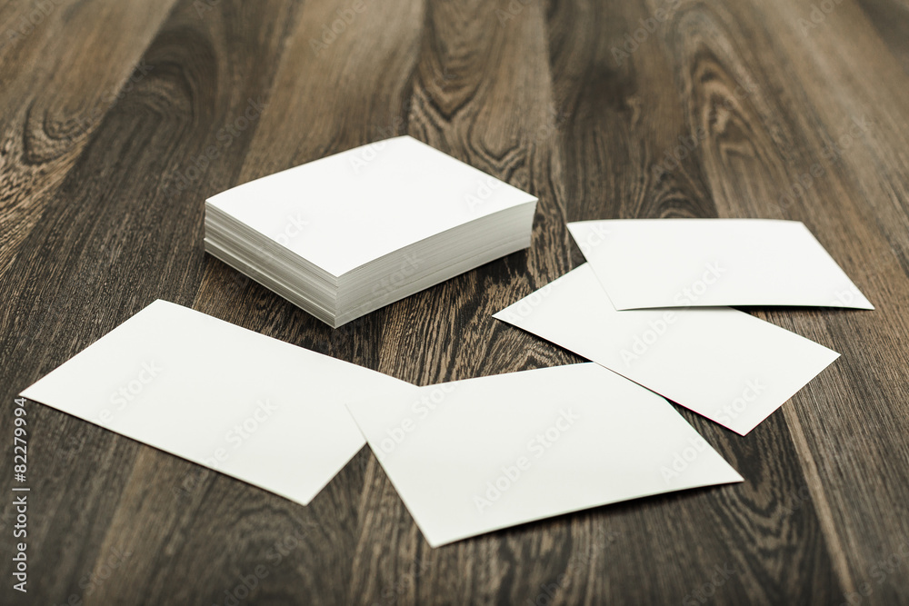 Blank business cards on wooden background Blank business cards on wooden background