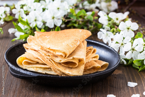 Crepes  folded in triangles on frying pan