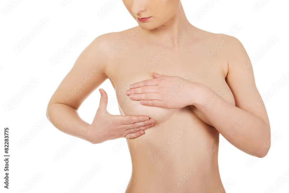 Fototapeta premium Woman examining breast.
