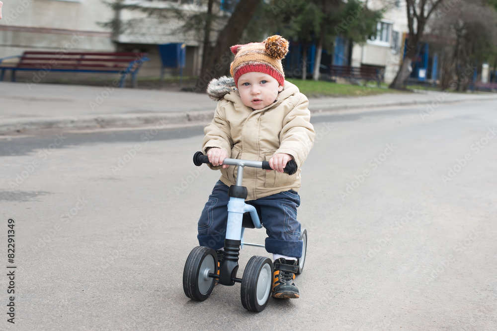 little boy riding runbike little boy riding runbike