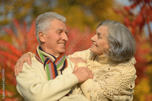  Senior couple in autumn park © aletia2011
