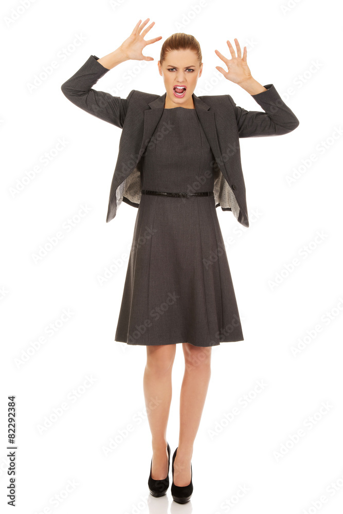 Frustrated business woman screaming. Frustrated business woman screaming.